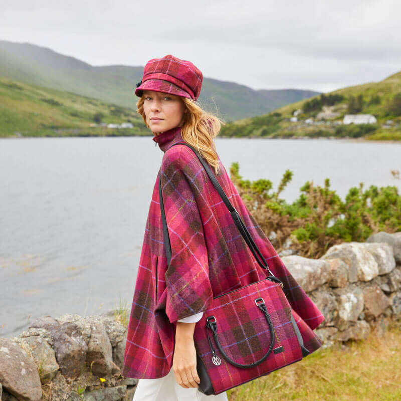 A stunning on-trend poncho from the renowned Mucros Weavers - Pink/Black